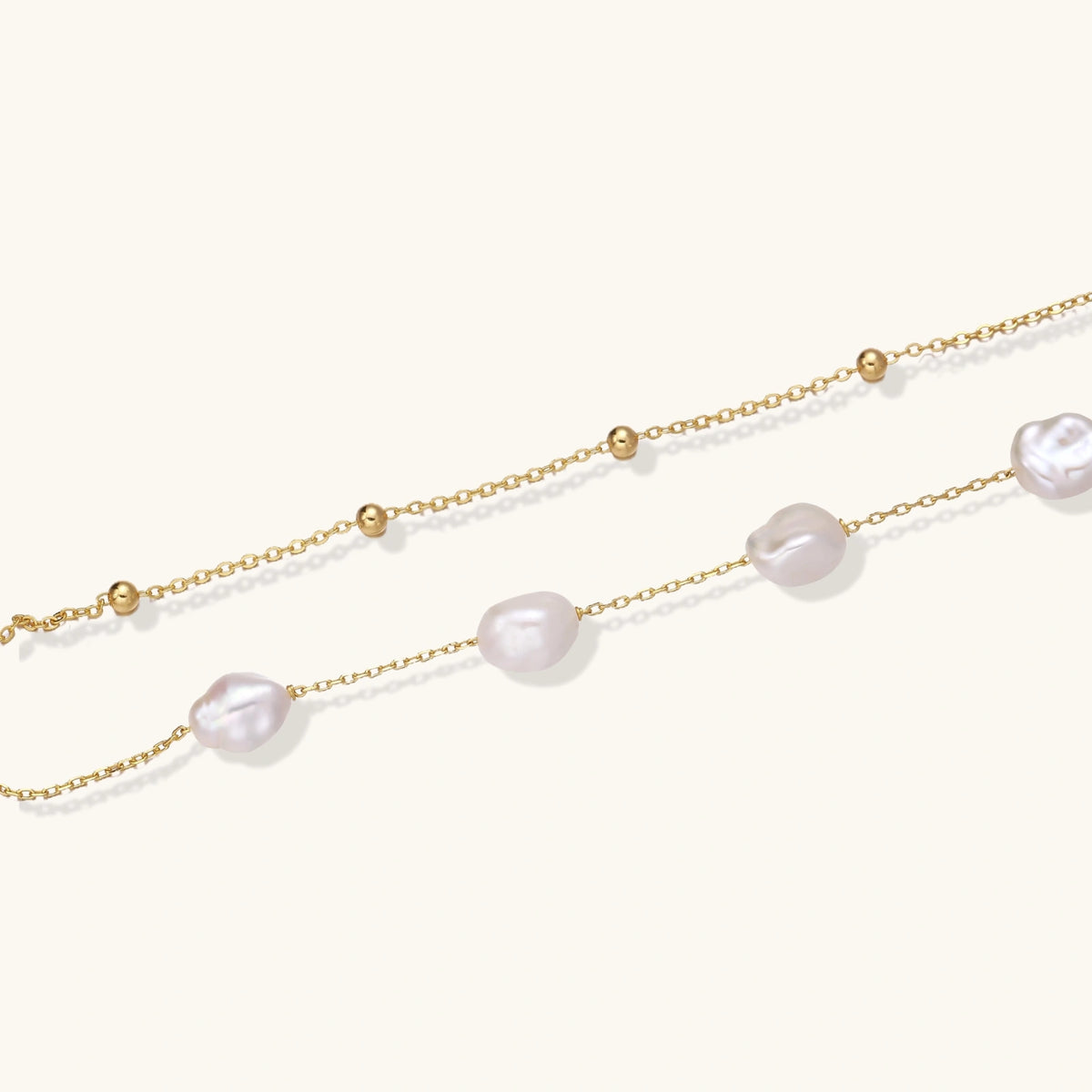 Close-up of baroque freshwater pearls and 18K gold vermeil bracelet