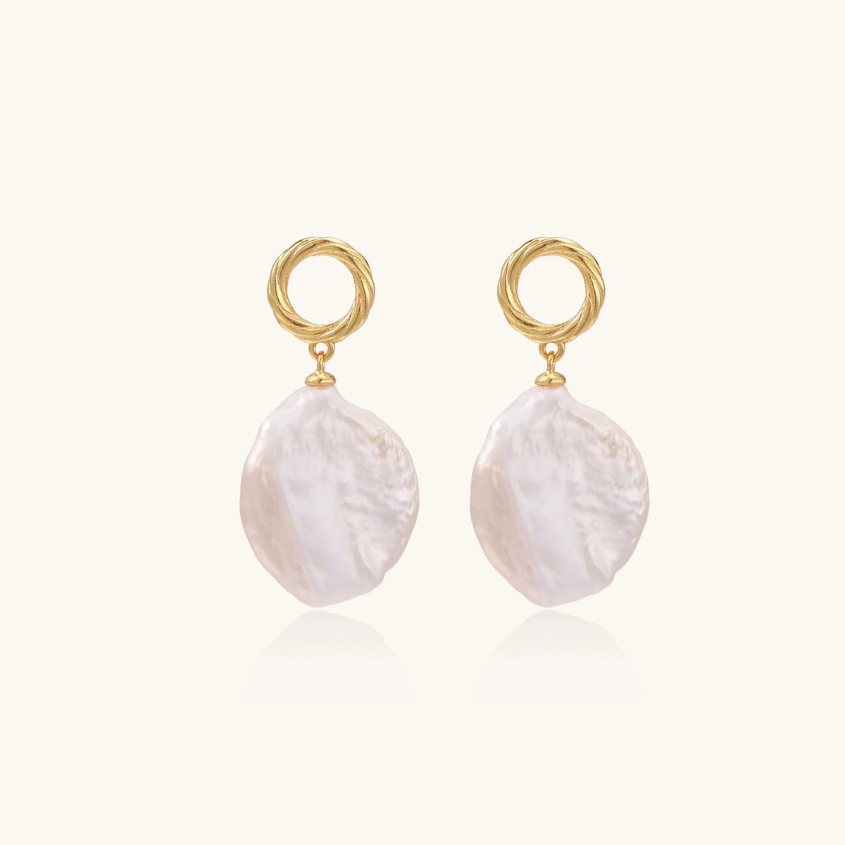 Front view of baroque pearl drop earrings with 18K gold vermeil twisted studs